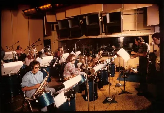 A classic Motown recording session with brass and rhythm sections.