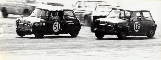 Don Peake driving Mini Cooper #51 on two wheels at 110mph