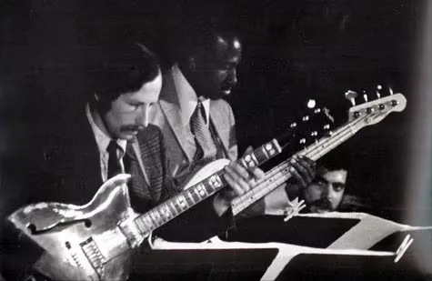 Don Peake working in a recording studio.